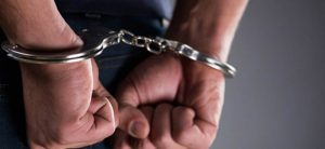 Five arrested for threatening people