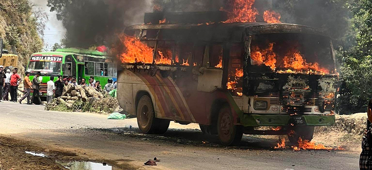 Running bus catches fire in Dhading