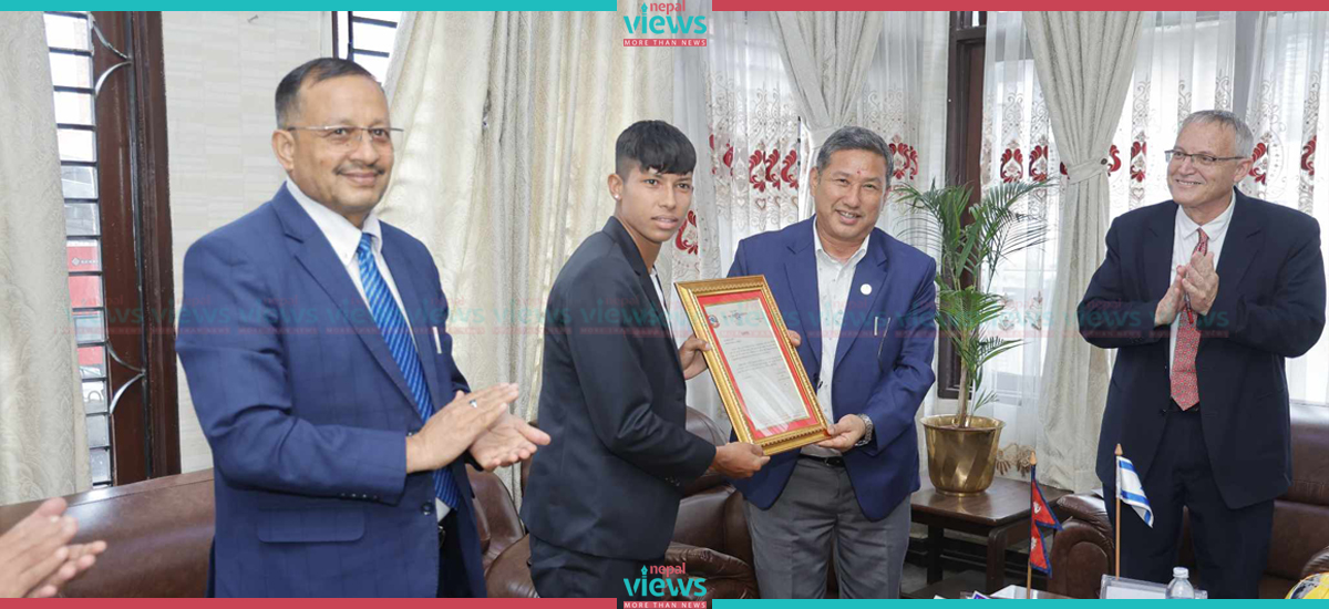 Minister Limbu applauds Sabitra Bhandari who is selected to play European Football