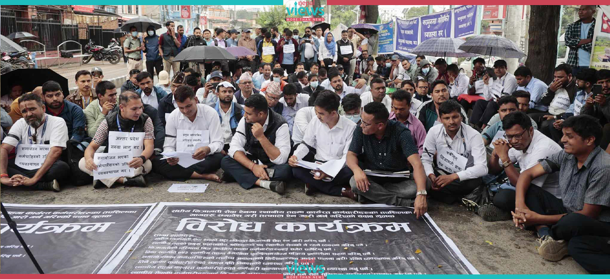 Demonstrating local-level employees  in rainfall at Mandala (Photo Feature)