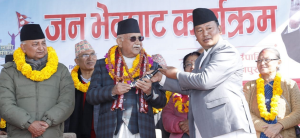 Oli receives Khukuri as gift in Bhojpur