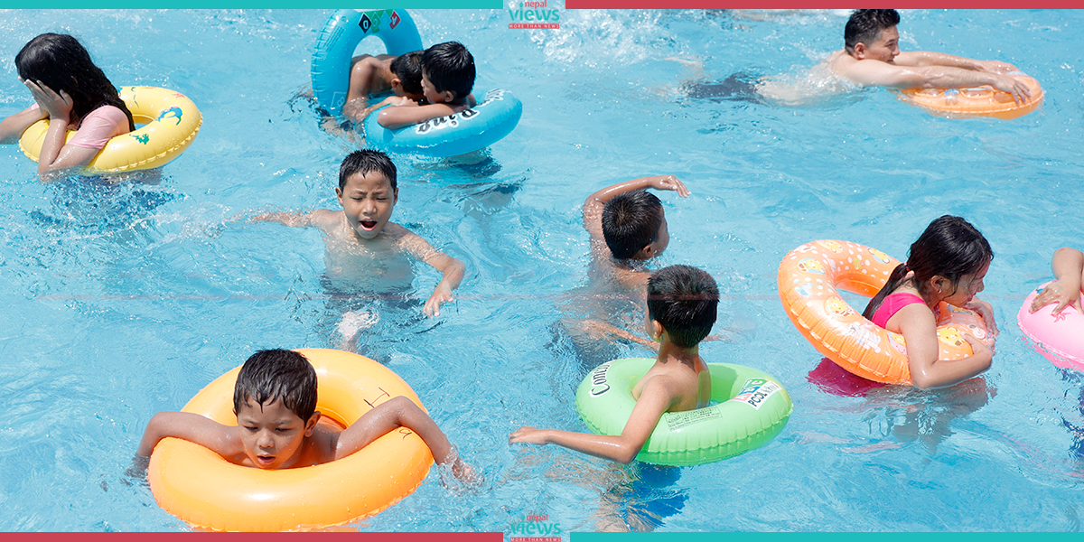 Swimming Pool to Beat Increasing Heat (Photo Feature)