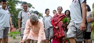 President Paudel plants paddy at Sheetal Niwas
