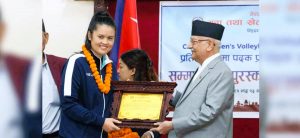 PM Oli awards national women volleyball players, coaches