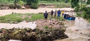 Two missing after being swept away by flood