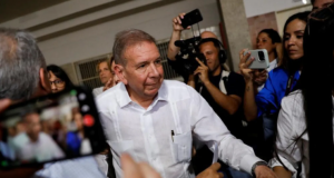 Venezuela says presidential opposition candidate has left country