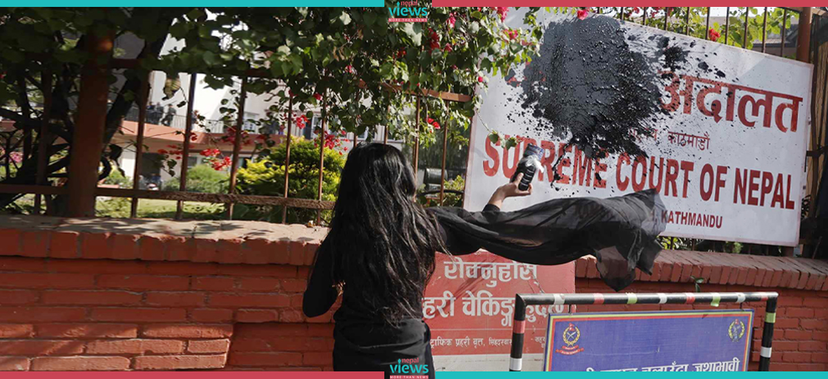 Binu Yadav arrested for splashing black color in Supreme Court’s signboard (Photo Feature)