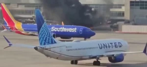 Fire aboard US airliner after diverted to Denver, 12 injured