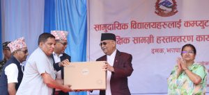 PM Oli distributes computers to 15 community schools