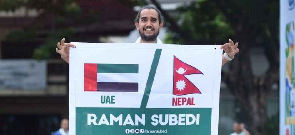 Raman completes Samui Half Marathon carrying flags of Nepal and UAE