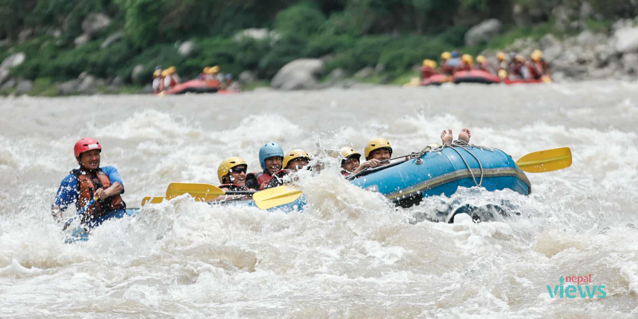 Rafting: An Arm Wrestling with Water Waves (Photo Feature)