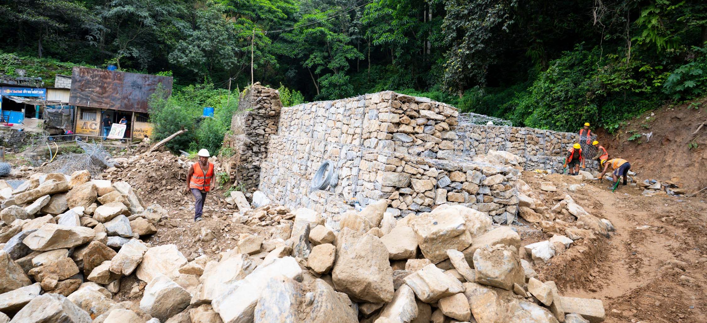 Landslide recovery and road reconstruction underway at Jhyaple Khola (Photos)